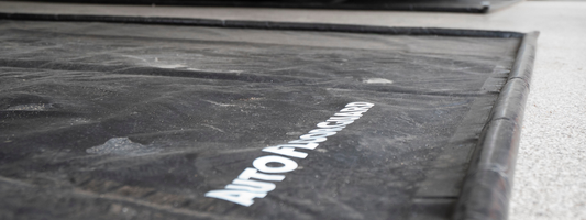 How Do Garage Floor Containment Mats Work?