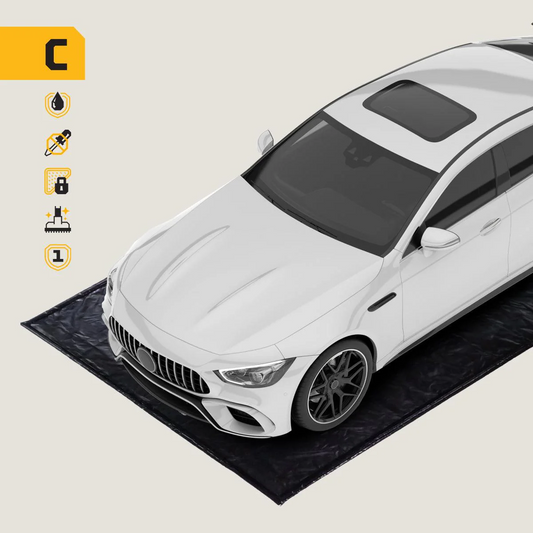 White car on a black mat with icons on the left side