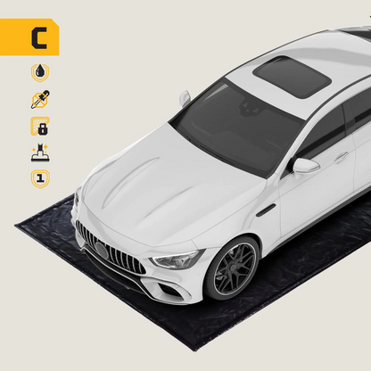 White car on a black mat with icons on the left side